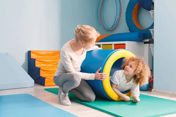 Boy having fun in tunnel — Stock Photo, Image