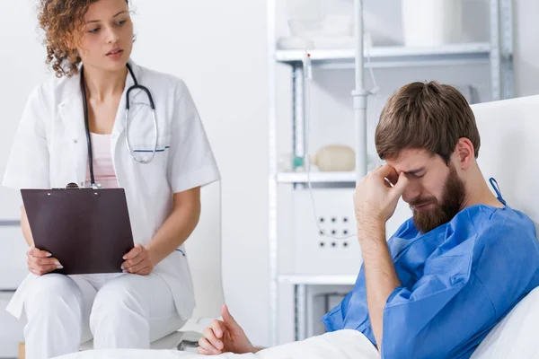 Psychiatrist supporting depressed patient — Stock Photo, Image