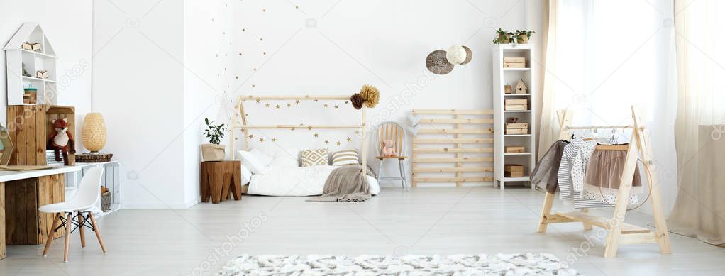 Baby room with wooden accessories