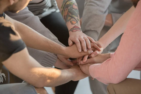 Group holding hands together — Stock Photo, Image