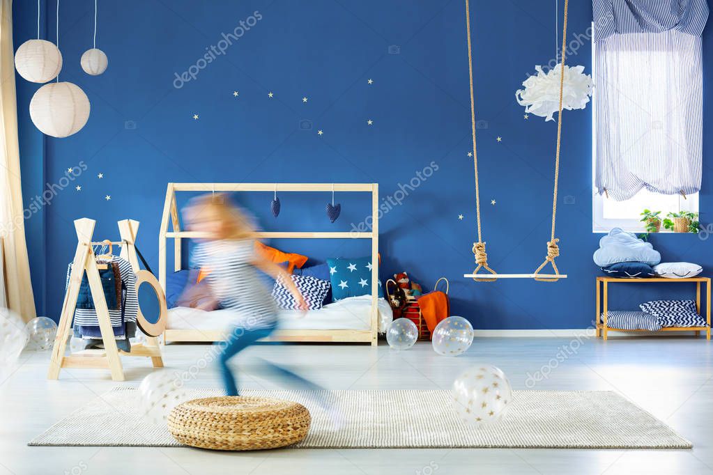 Child bedroom with blue wall