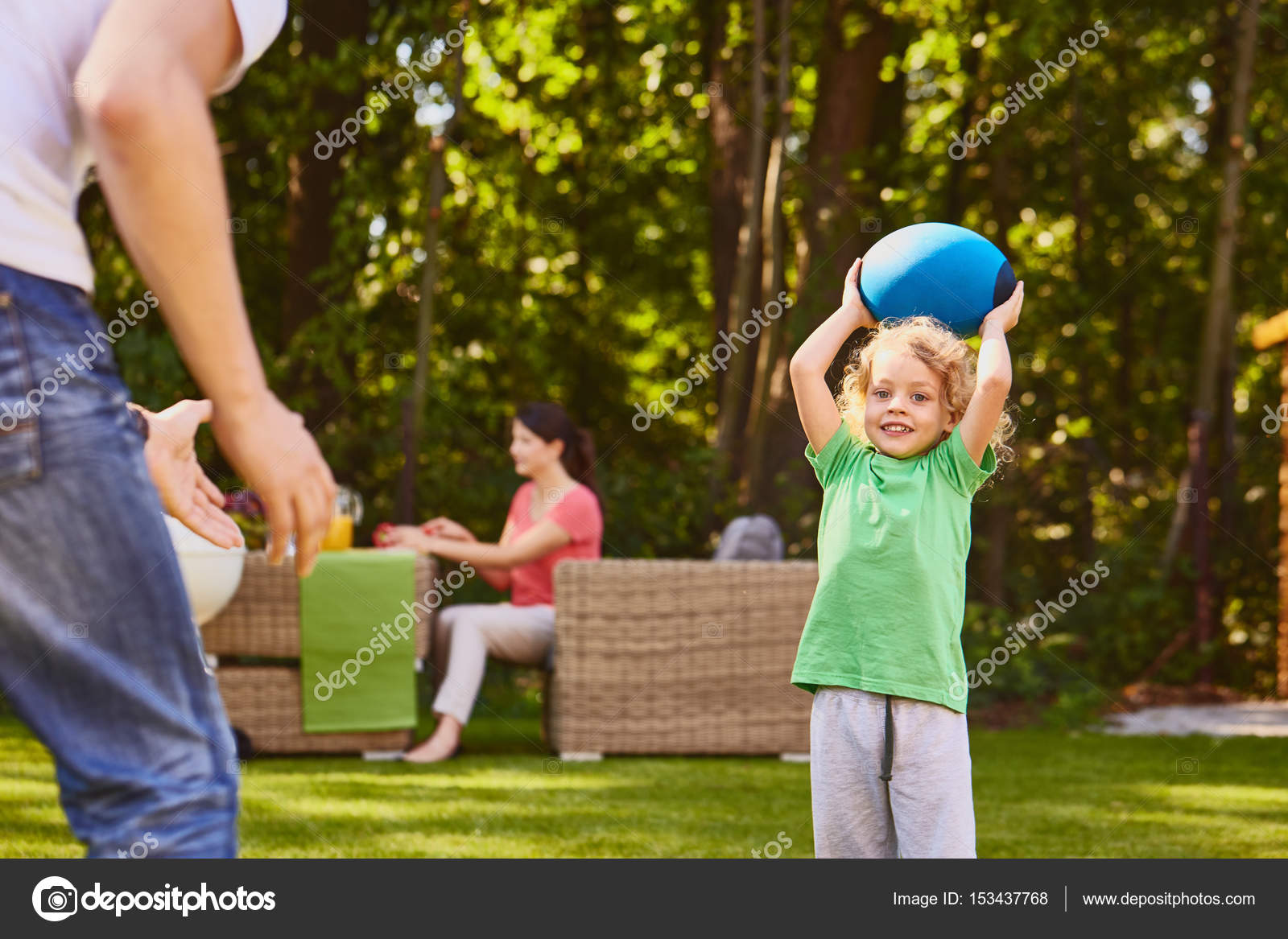 Boy holding rugby ball Stock Photo by ©photographee.eu 153437768
