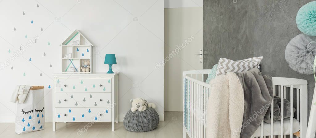 Childs room with white cot