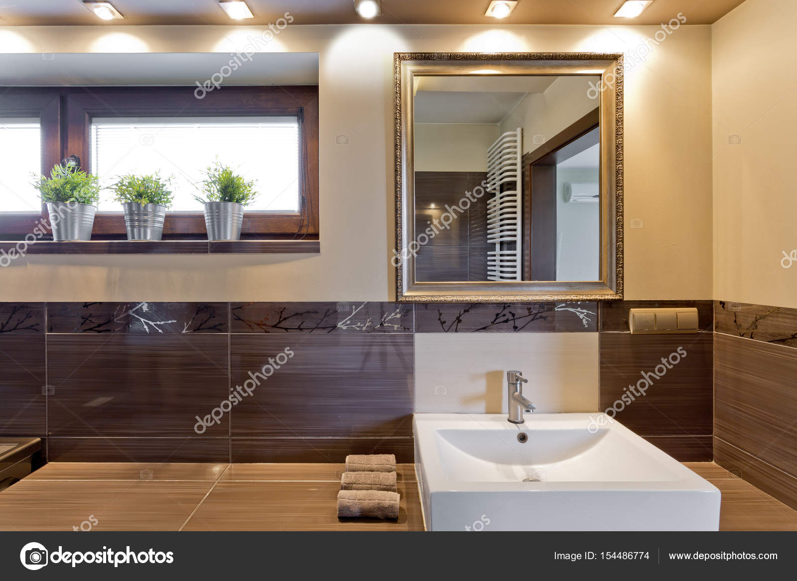 Brown Bathroom With Mirror Above Sink Stock Photo Photographee Brown Bathroom With Big Tiles And Old Fashioned Mirror Above Wide Sink Photo By Photographee Eu
