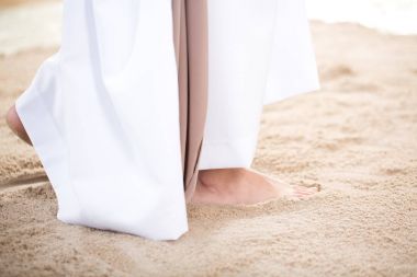Christ walking on sand clipart
