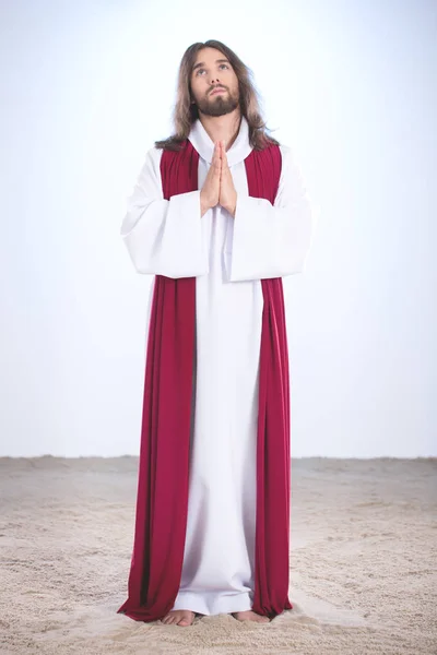 Jesus betet auf Sand — Stockfoto