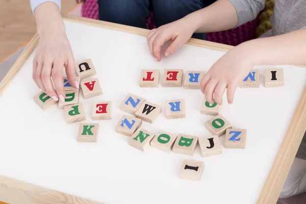 Wooden blocks with letters — Stock Photo, Image