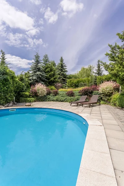 Luxurious villa garden with a pool