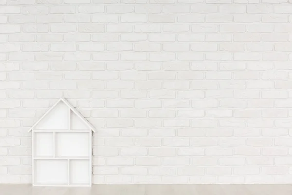 Witte bakstenen muur baby kamer — Stockfoto