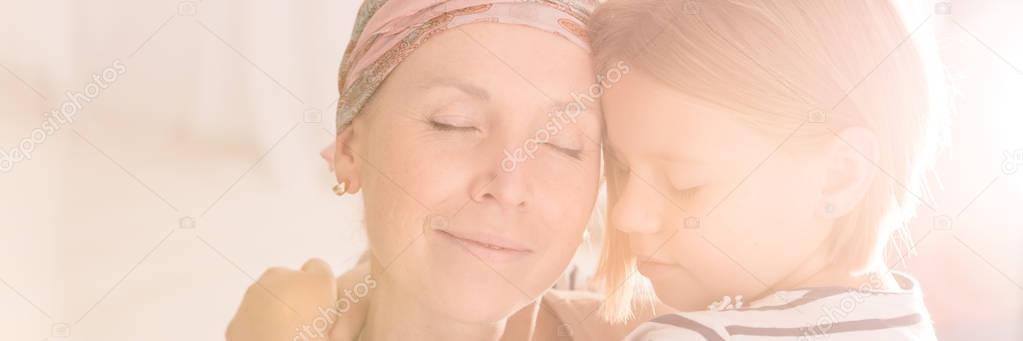 Girl hugging mother