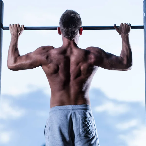 Sportsman dangling on rod — Stock Photo, Image