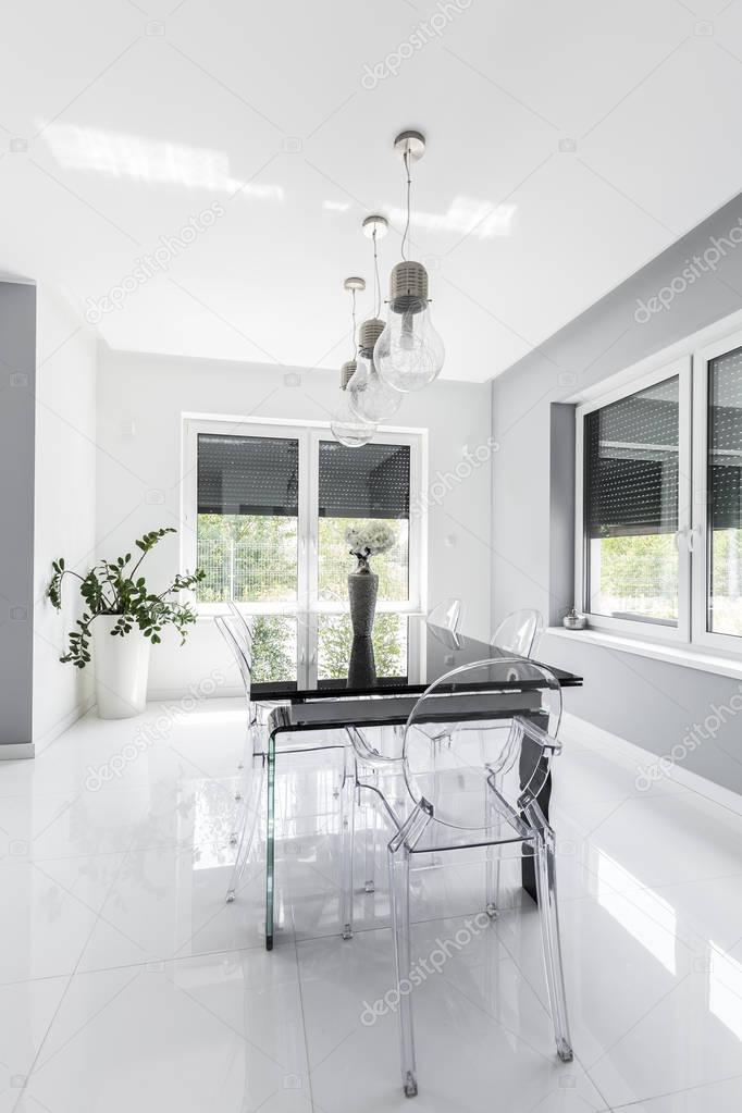 Minimalist modern dining room designed in white