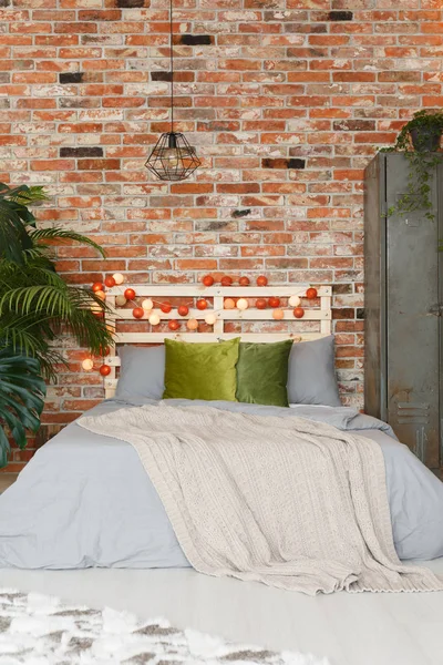 Cozy bed with stylish bedding — Stock Photo, Image
