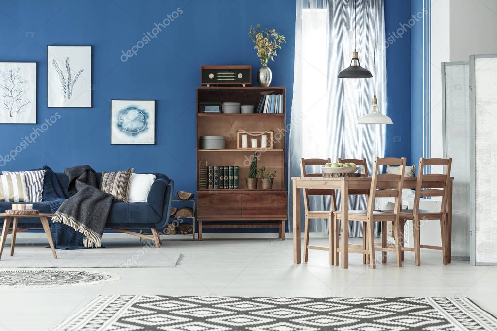 Apartment with dining table and sofa