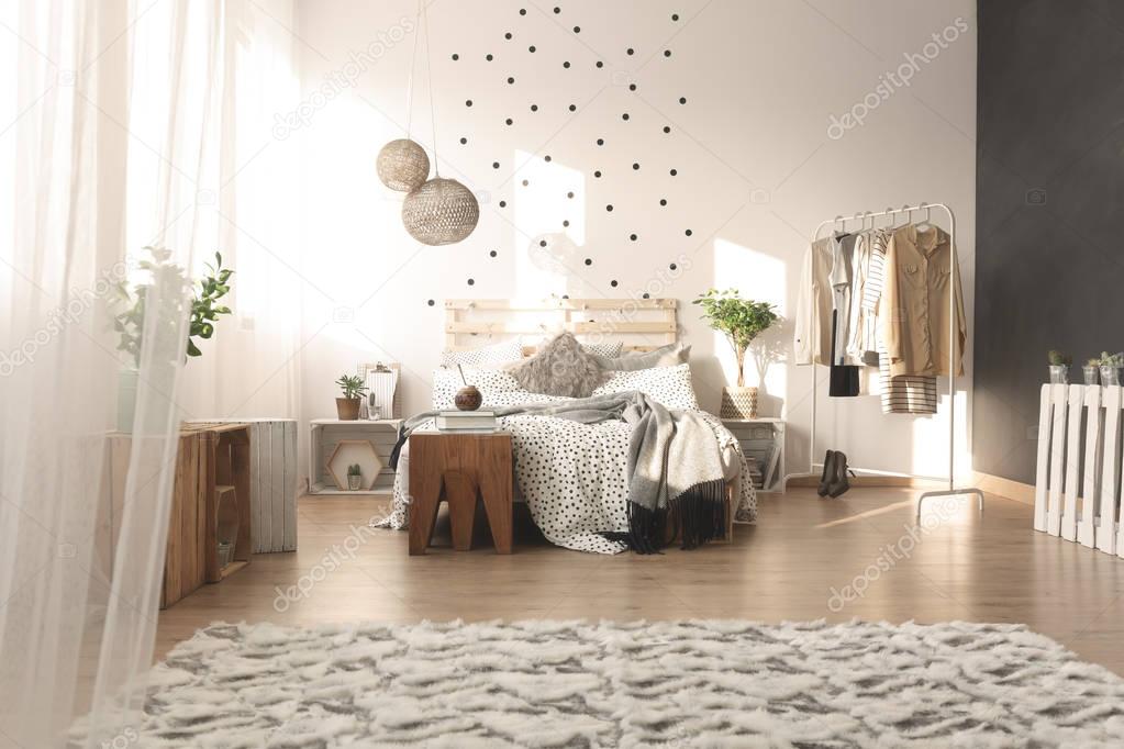 Bedroom with dot wall