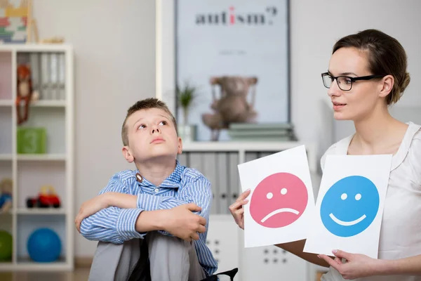 Sad boy and his psychologist — Stock Photo, Image