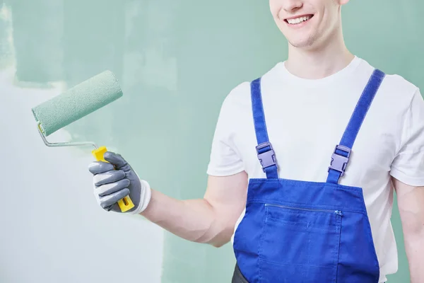 Professional painter with roller — Stock Photo, Image