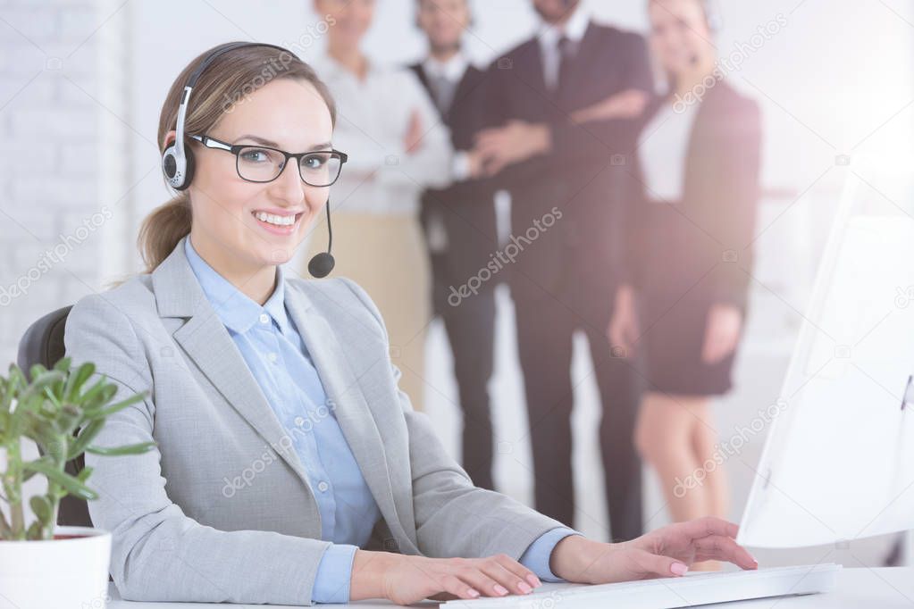 Customer service agent and her colleagues