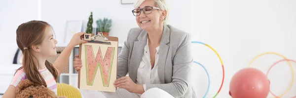 Girl on additional classes — Stock Photo, Image