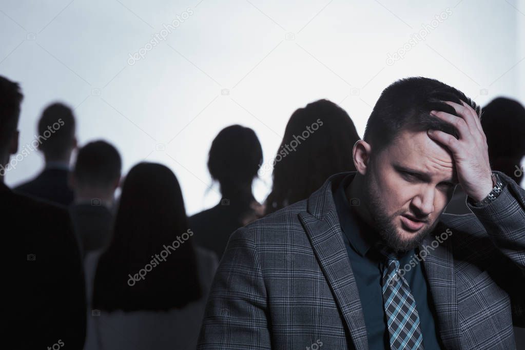 Exhausted man in crowd
