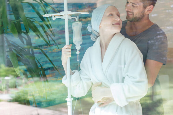 Couple by the hospital window