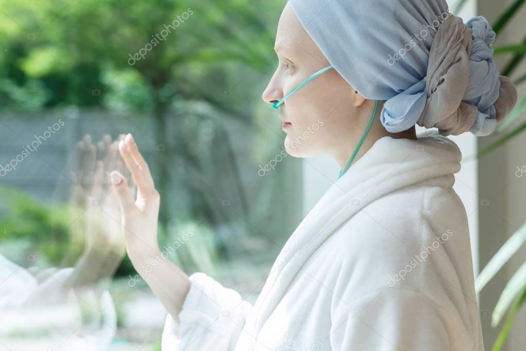 Lady touching glass
