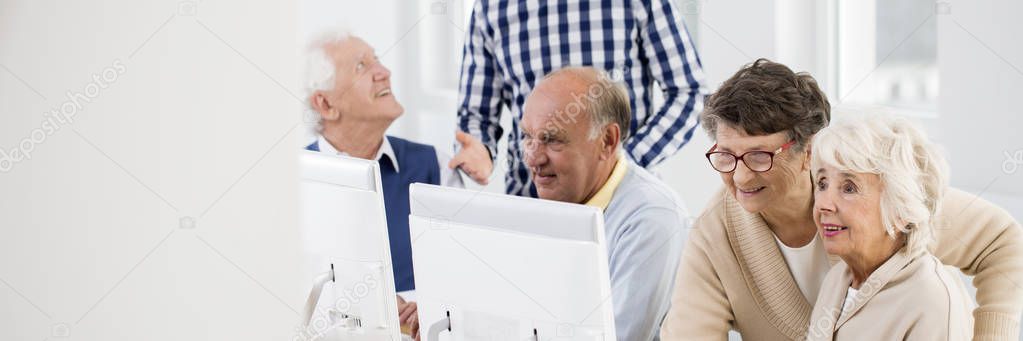 Seniors enjoying computer activities