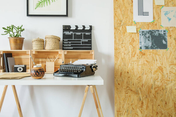 Hygge interior design with wooden desk