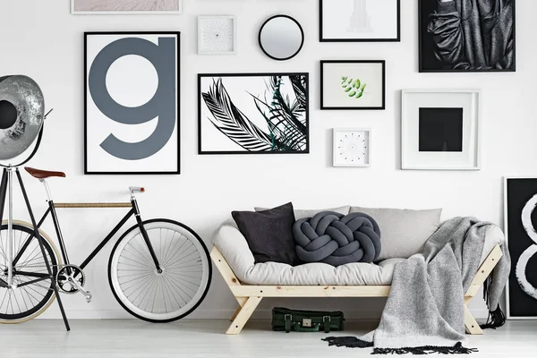 Bike by the sofa — Stock Photo, Image