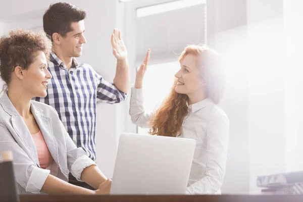Business colleagues giving high five — Stock Photo, Image
