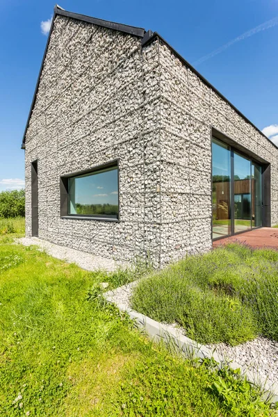 Modern pebble stone wall house — Stock Photo, Image