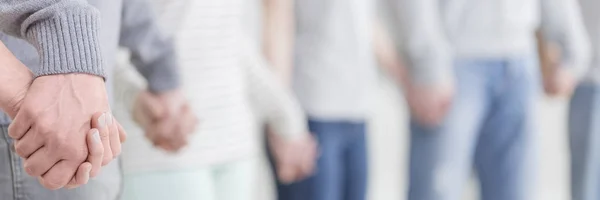 Patients holding hands — Stock Photo, Image