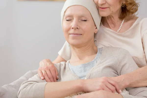 Resting in friend's arms — Stock Photo, Image