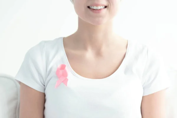 Breast cancer woman wearing ribbon — Stock Photo, Image