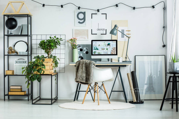 Metal shelf with black globe