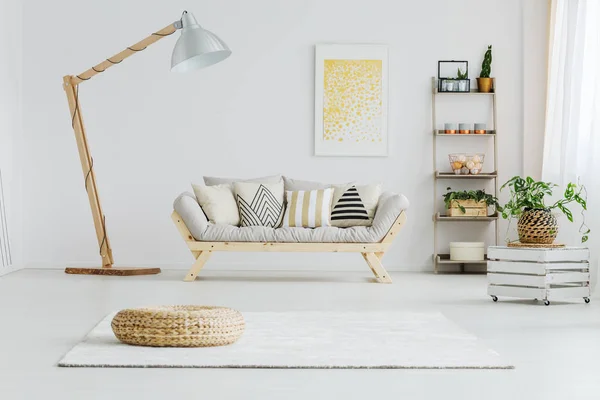 Grey sofa in bright living room — Stock Photo, Image