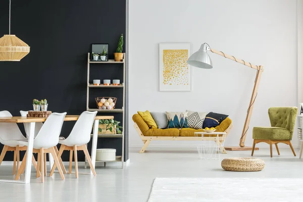 Shelf against black wall — Stock Photo, Image