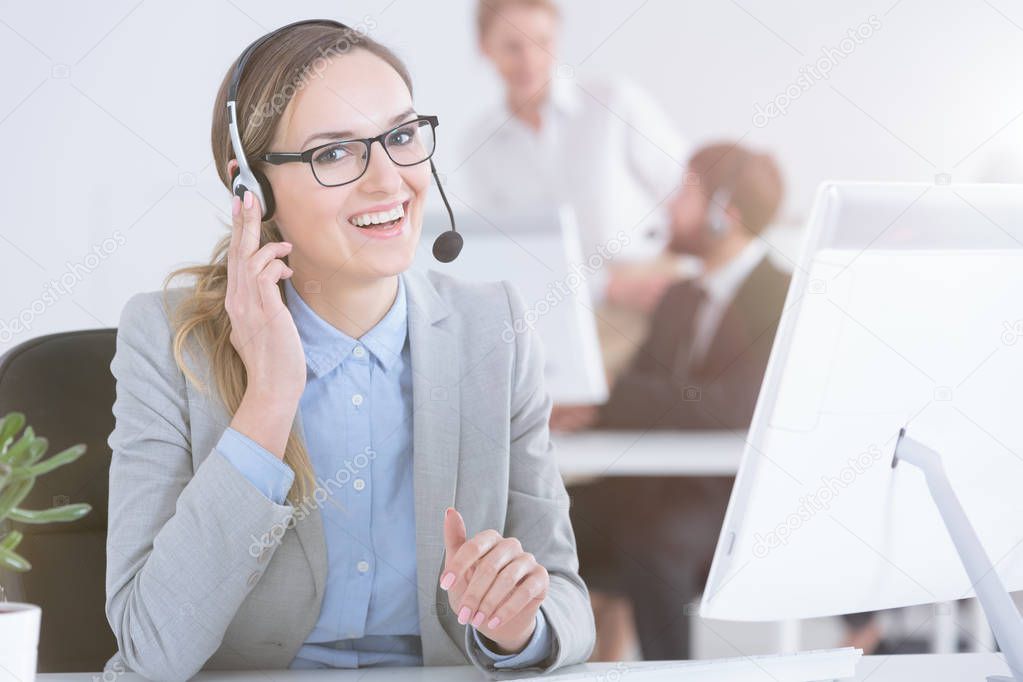 Call center worker listening to customers