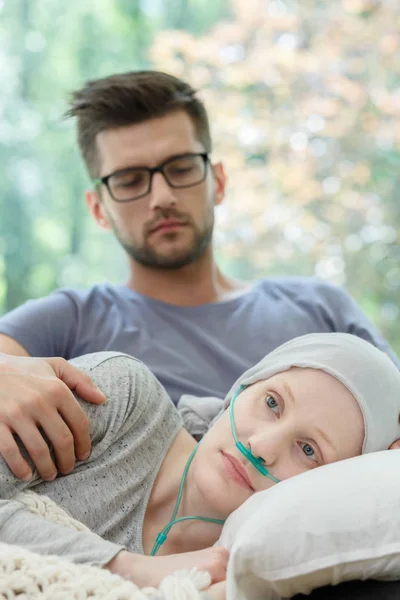 Girl with nasal cannula resting — Stock Photo, Image