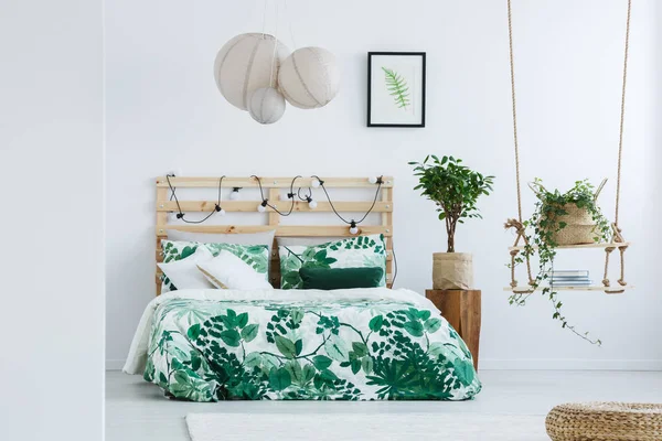 Simple bedroom with small tree — Stock Photo, Image