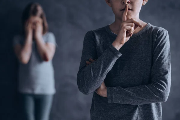 Scared children suffering in silence — Stock Photo, Image