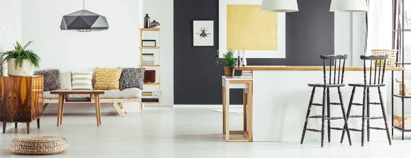 Simple sofa and kitchen island — Stock Photo, Image