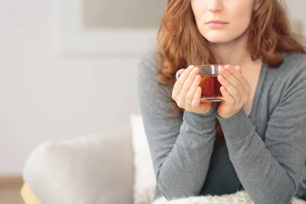 Woman with hot lemon tea — Stock Photo, Image