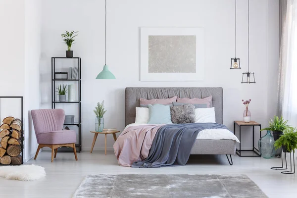 Pastel bedroom with comfortable chair — Stock Photo, Image