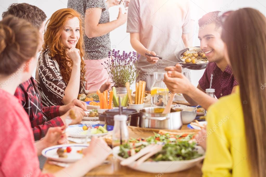 People eating healthy organic dishes