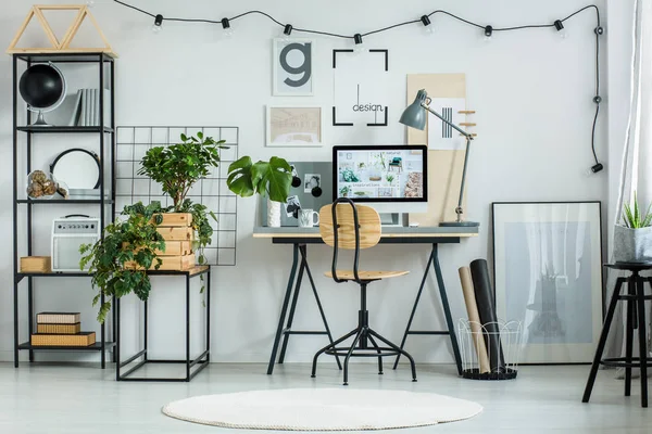 Designer's workspace with classic chair — Stock Photo, Image