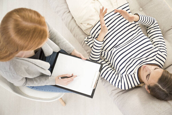 Patient on settee during psychoanalysis
