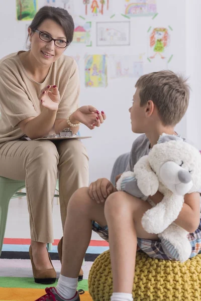 Boy is holding stuffed toy — Stock Photo, Image