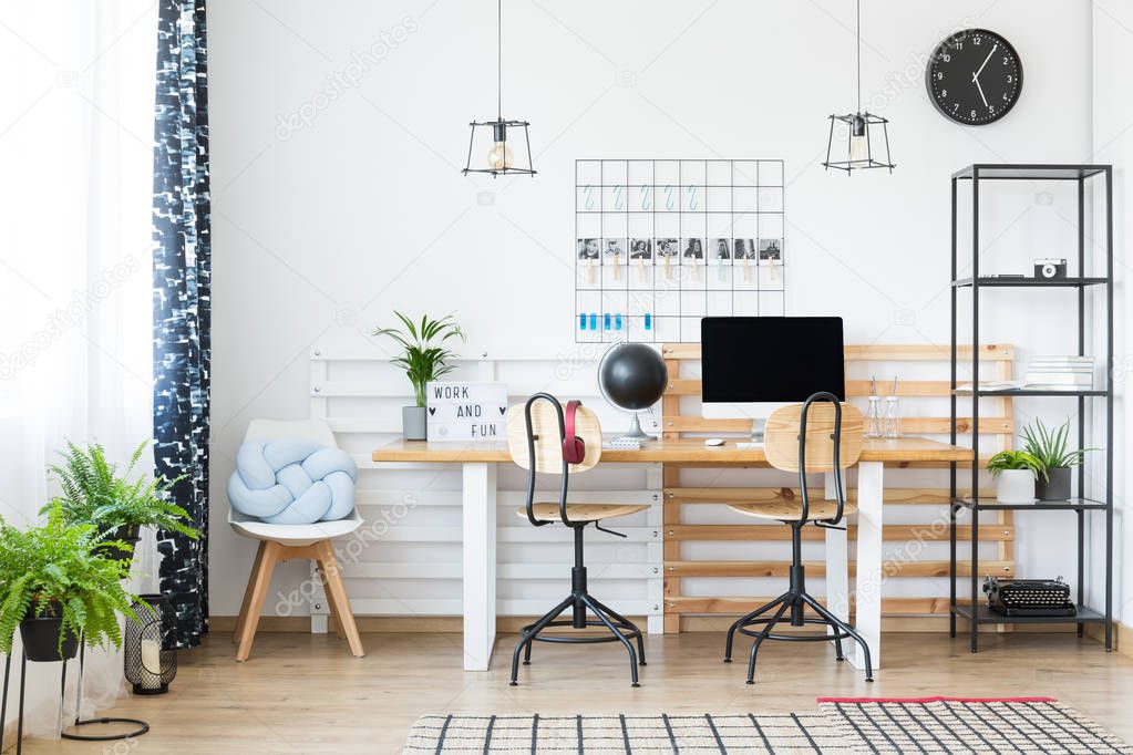 Bright workplace with two chairs