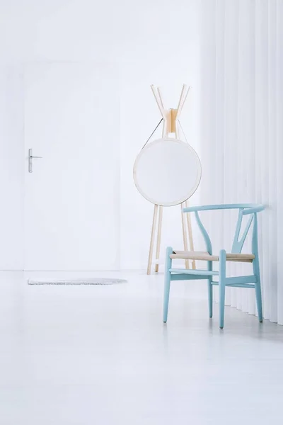 Modern mirror and retro chair